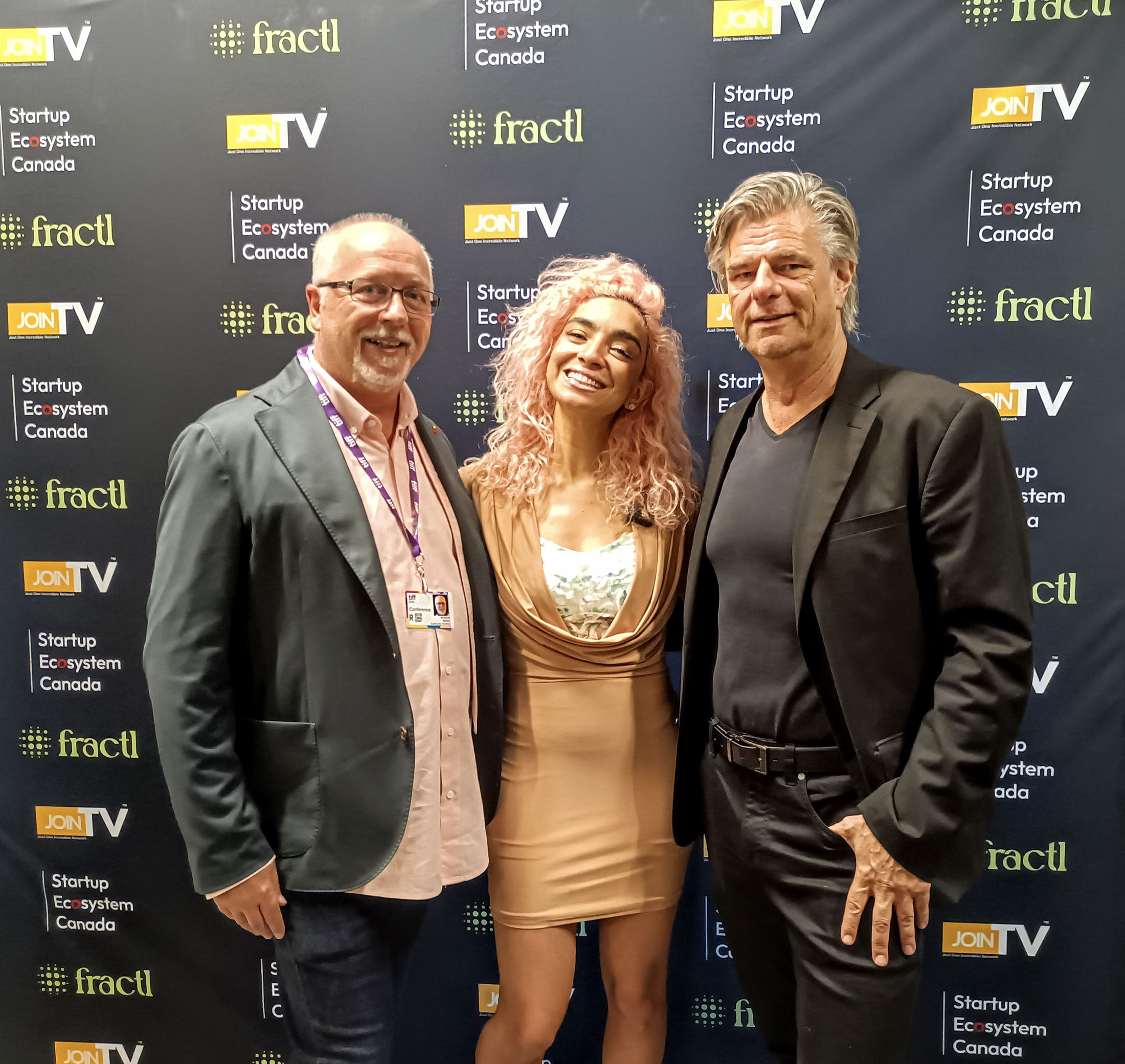 Three guests at a startup ecosystem event