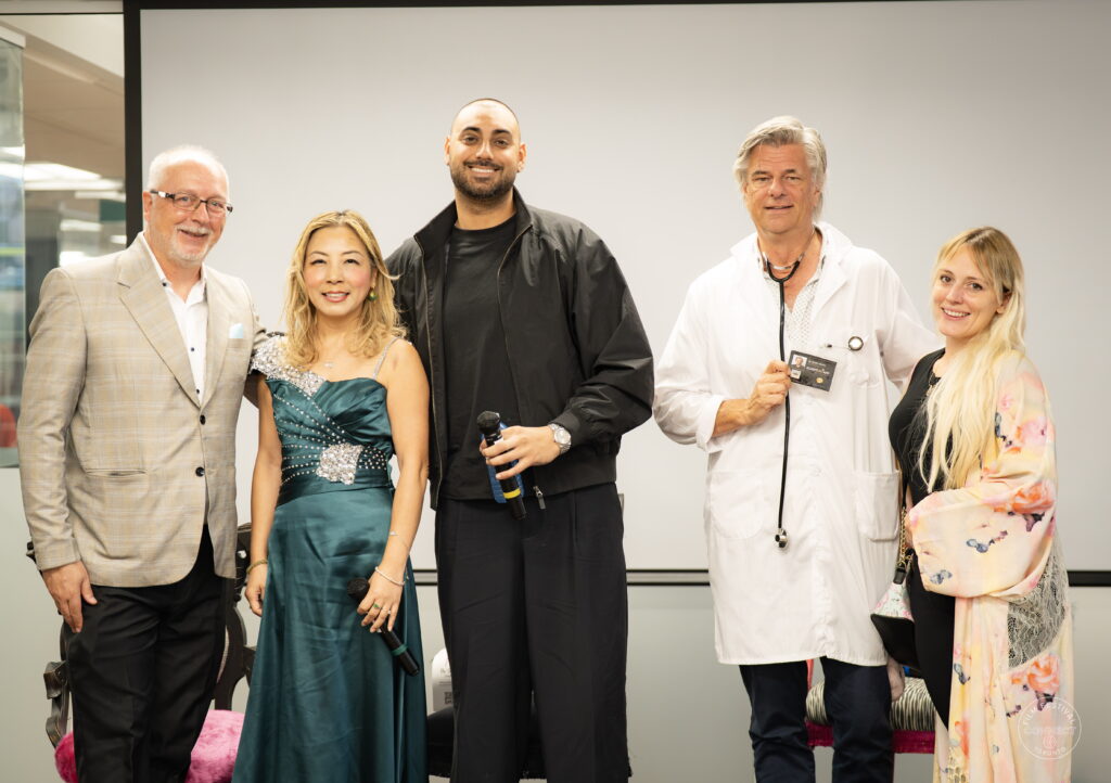 Five event participants pose for a group photograph on the AI & Film Forum stage.