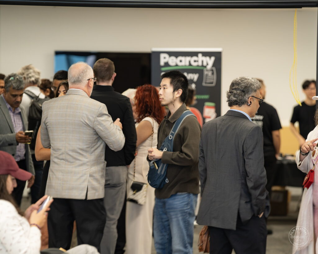 Attendees gather in small groups to talk and network after the AI & Film Forum discussions.